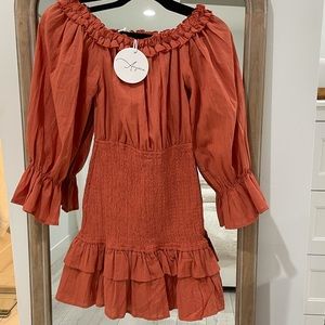 off the shoulder mini dress in color rust